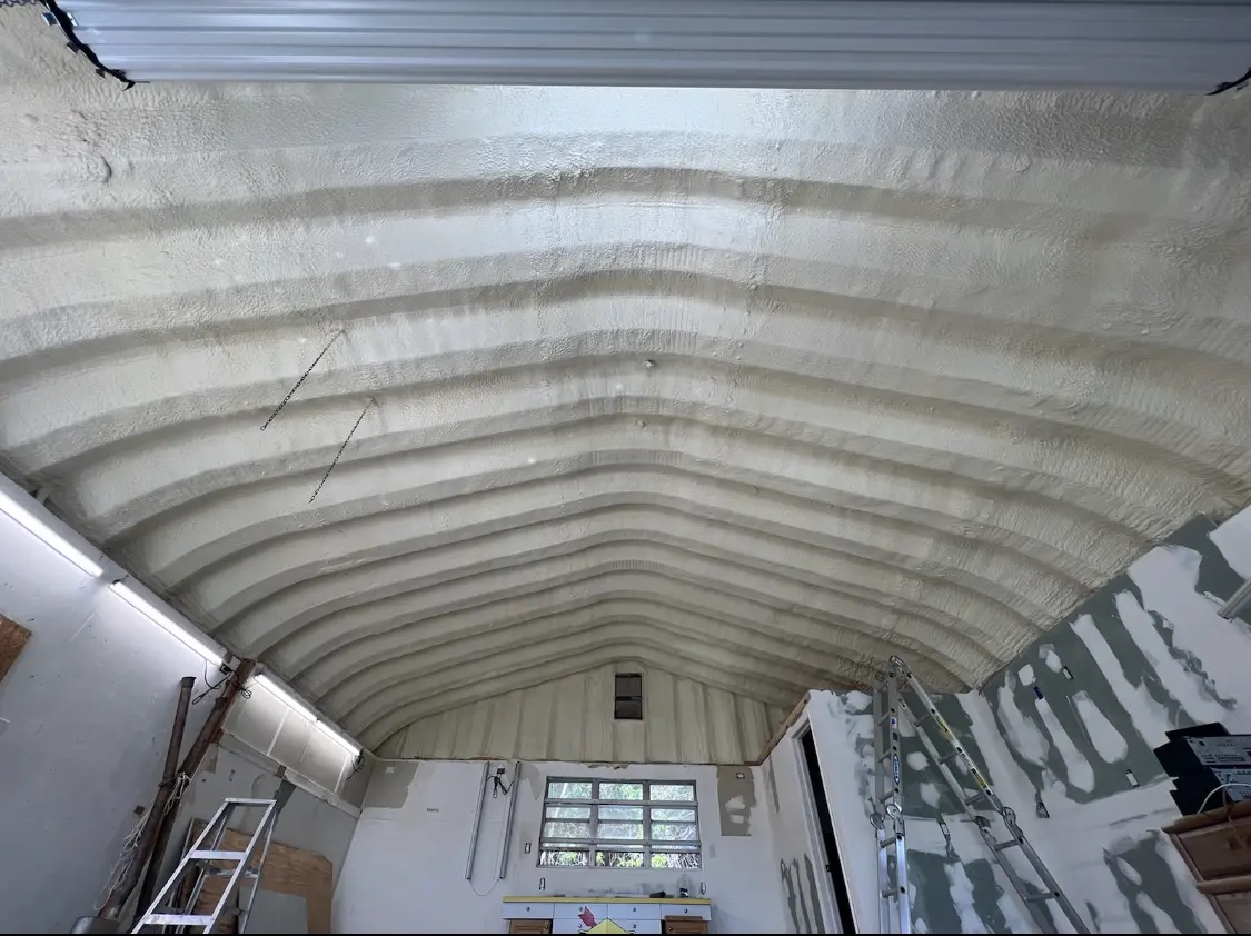 Spray polyurethane foam applied to the underside of a metal roof deck in Wheatfield